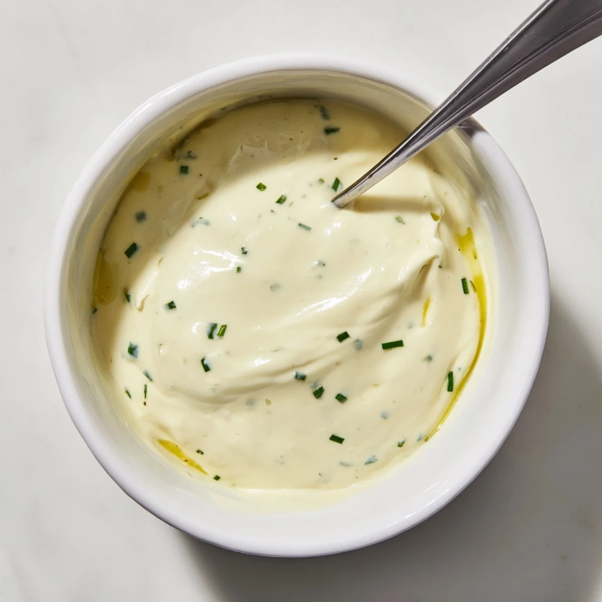Creamy dressing, a thick, white sauce, is perfect with fresh vegetables for a flavorful bite.