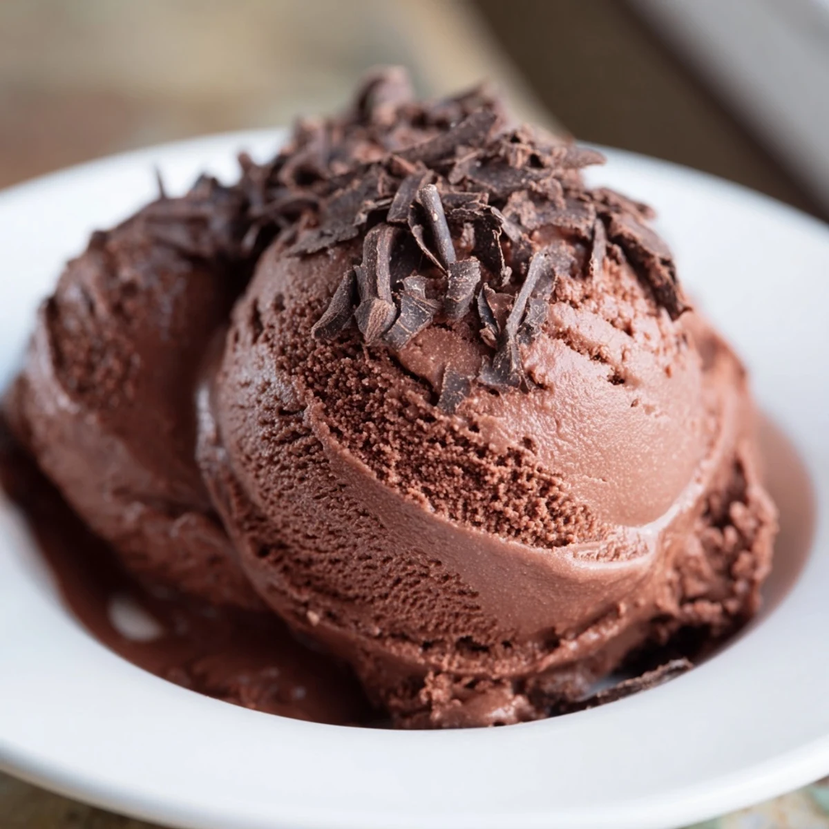 Velvety, dark chocolate ice cream, perfect for a summer treat or a cozy night in.