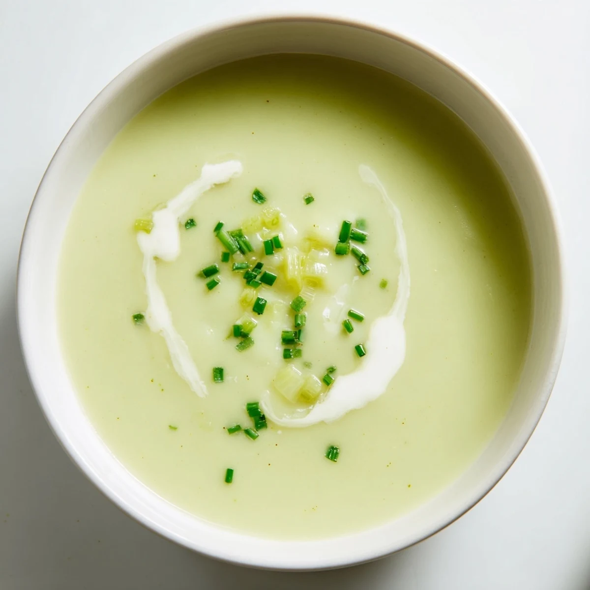 Close-up of the flavorful Creamy Leek Soup, ready to be enjoyed with crusty bread.