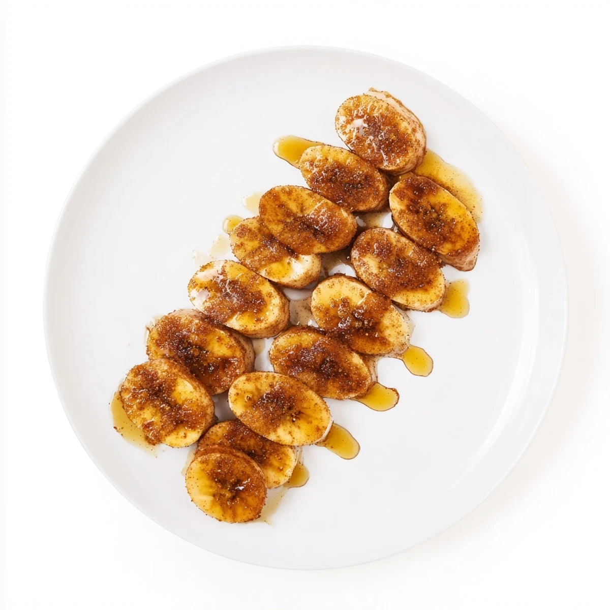 Dessert rapide aux bananes poêlées nappées de sirop doré et de cannelle aroma